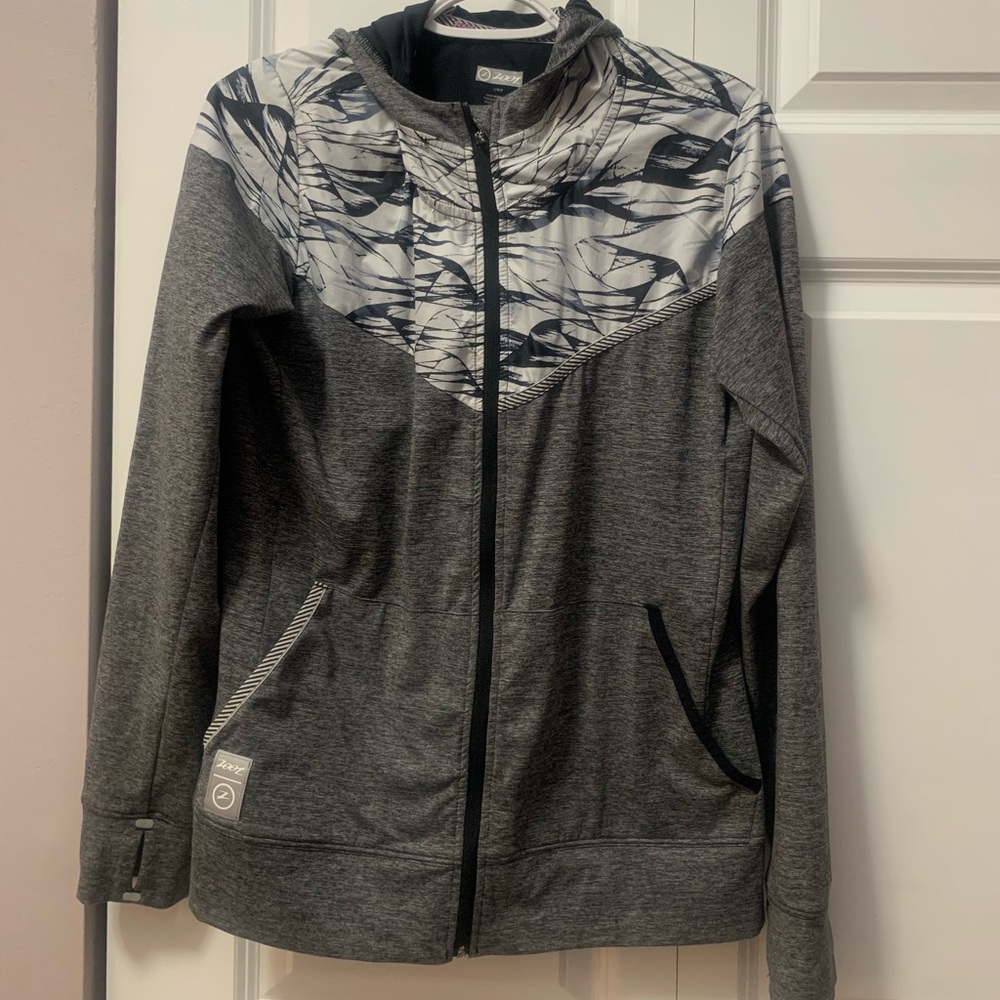 Zoot running jacket with hood. Good condition